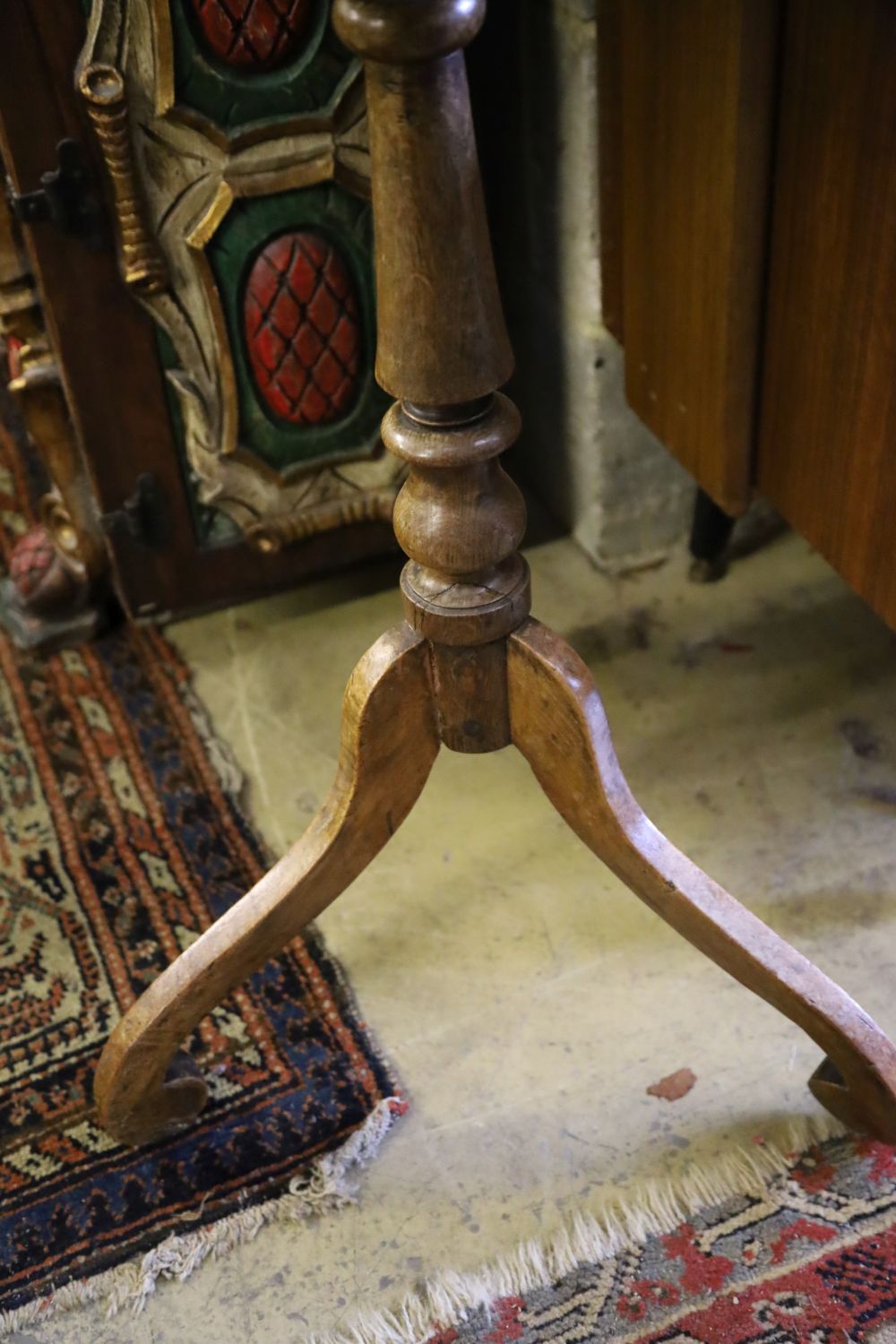 A 19th century elm candle stand, with burr wood top on tripod base, 37cm diameter, 72cm high